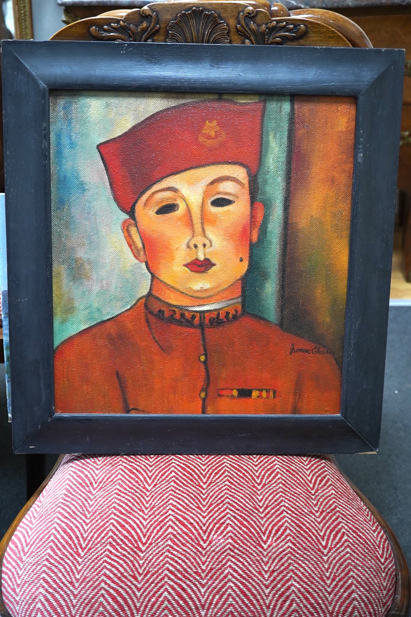 Yvonne Eleini (Russian, 1900-), oil on canvas board, Portrait of a Russian soldier in military dress, signed, 41 x 38cm. Condition - good